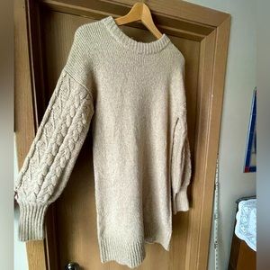 Beautiful tan sweater dress with puffy patterned sleeves!